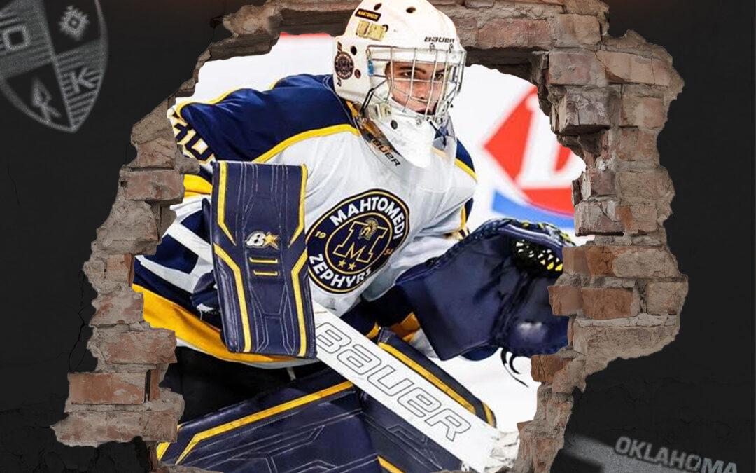 MAHTOMEDI GOALTENDER JACKSON CHESAK TENDERS WITH WARRIORS